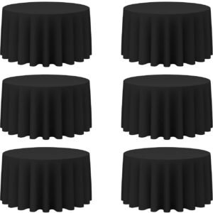 Modern black tablecloth that adds contrast and depth to event table design.