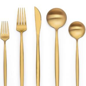 Luxury gold flatware set including a dinner knife, spoon, and fork.
