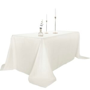 Classic ivory rectangular tablecloth ideal for banquet tables, receptions, and corporate events.